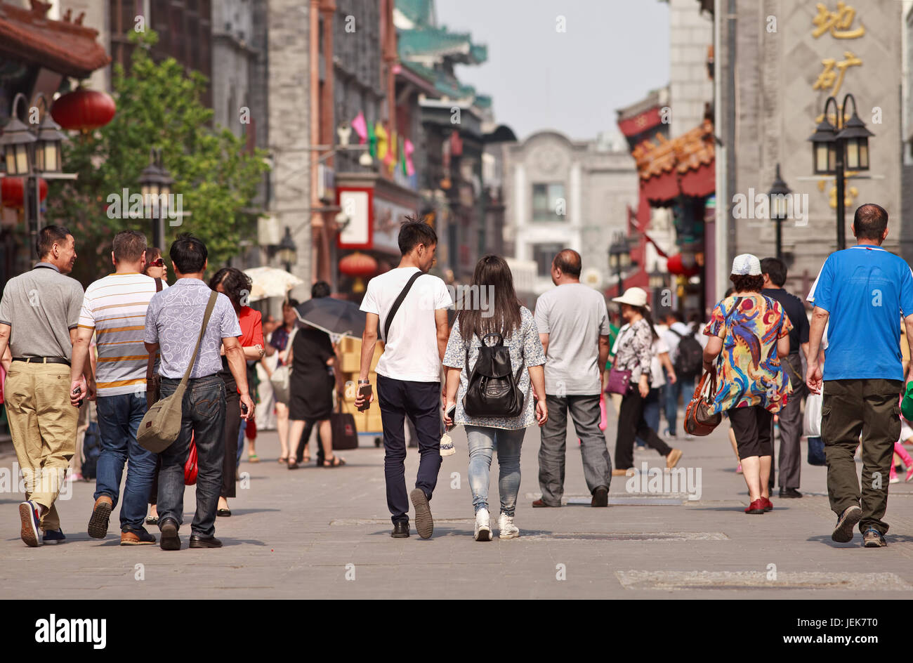 BEIJING-JUNE 9, 2015. Traditional shopping street. Although rapid modernization there are still many traditional areas around Tiananmen Square. Stock Photo