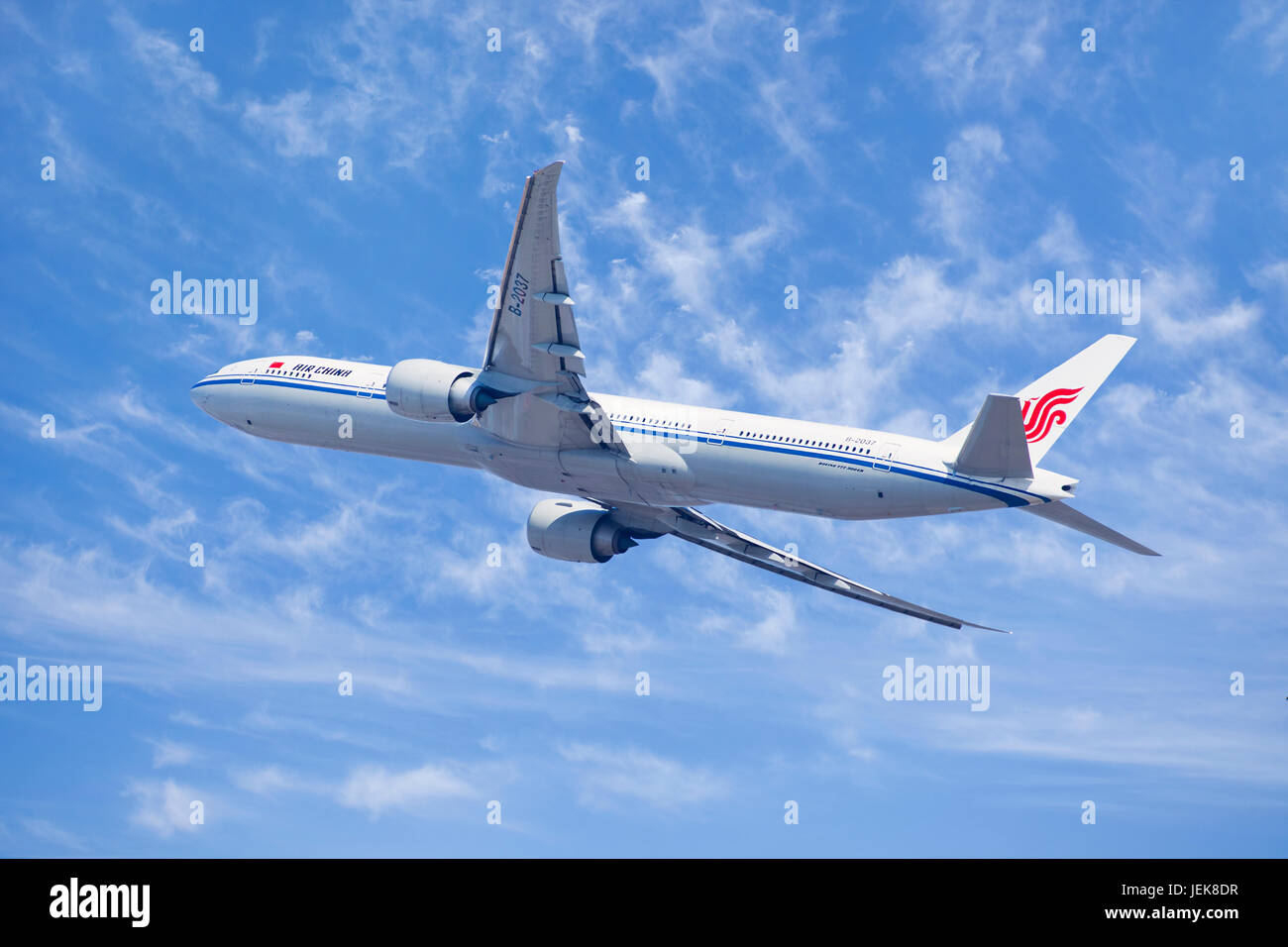 BEIJING–MARCH 6, 2014. Air China Boeing 777-300, B-2037 in the air. It is the World's largest twin-jet with seating capacity for 314 to 451 passengers. Stock Photo
