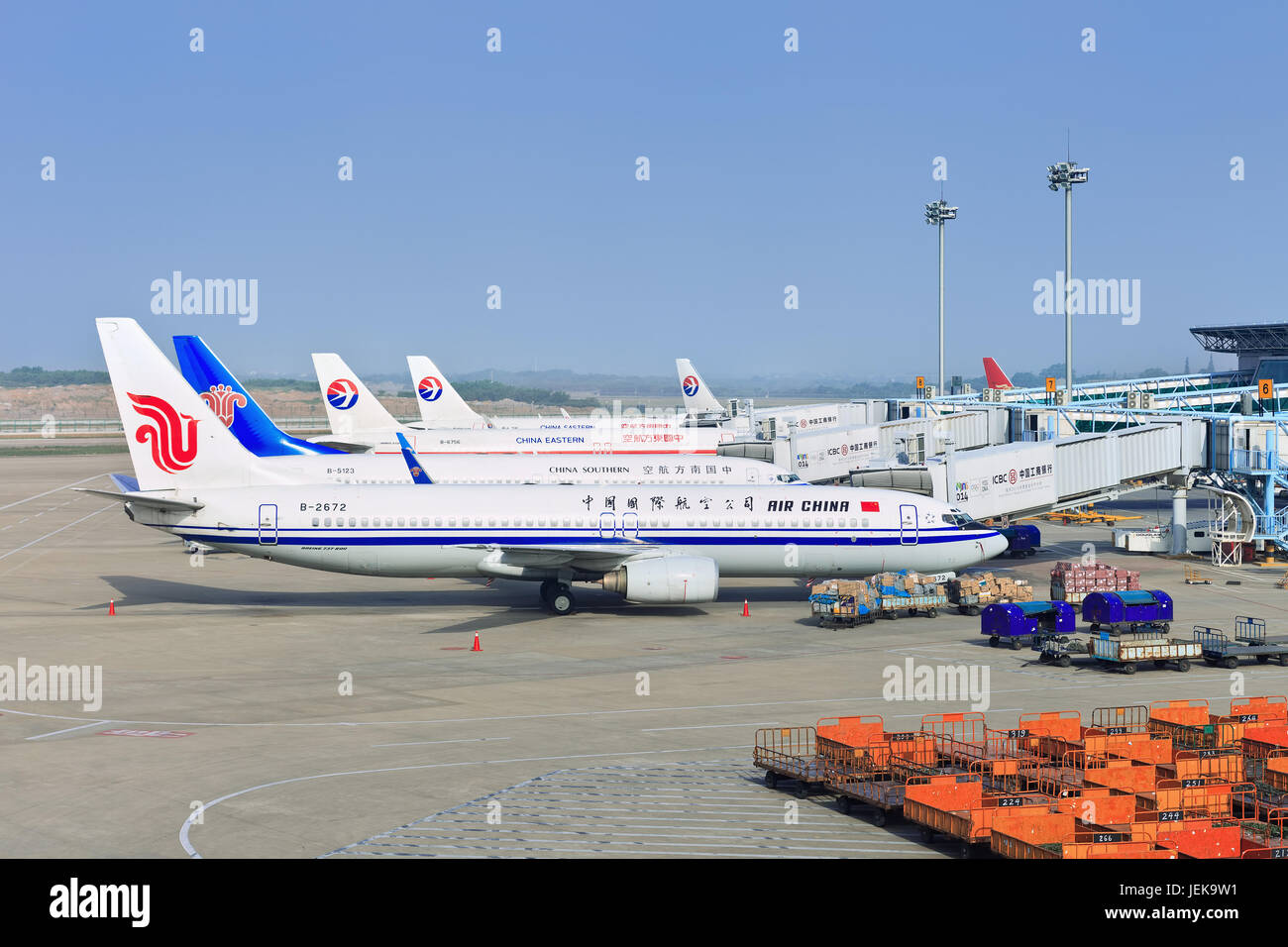 NANJING-MAY 27, 2014. Parked airplanes at Nanjing Lukou International Airport which consists of two terminals, two 3600m runways, two control towers. Stock Photo