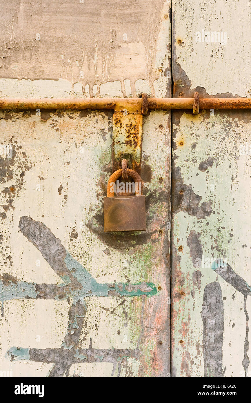 Old industrial door with sliding lock Stock Photo Alamy