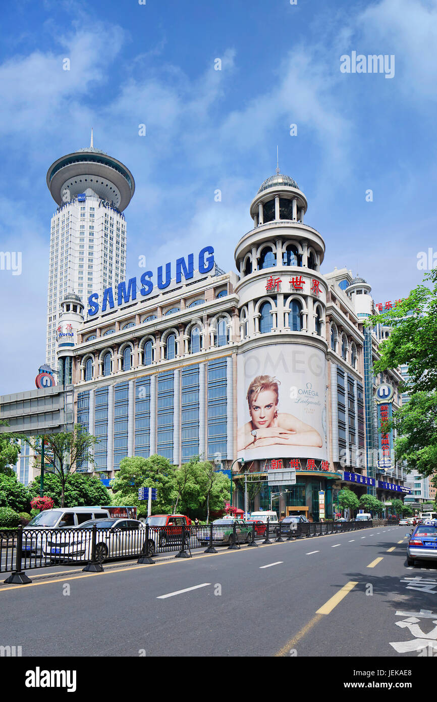 SHANGHAIMAY 5, 2014. Colonial building with Omega commercial. Shanghai