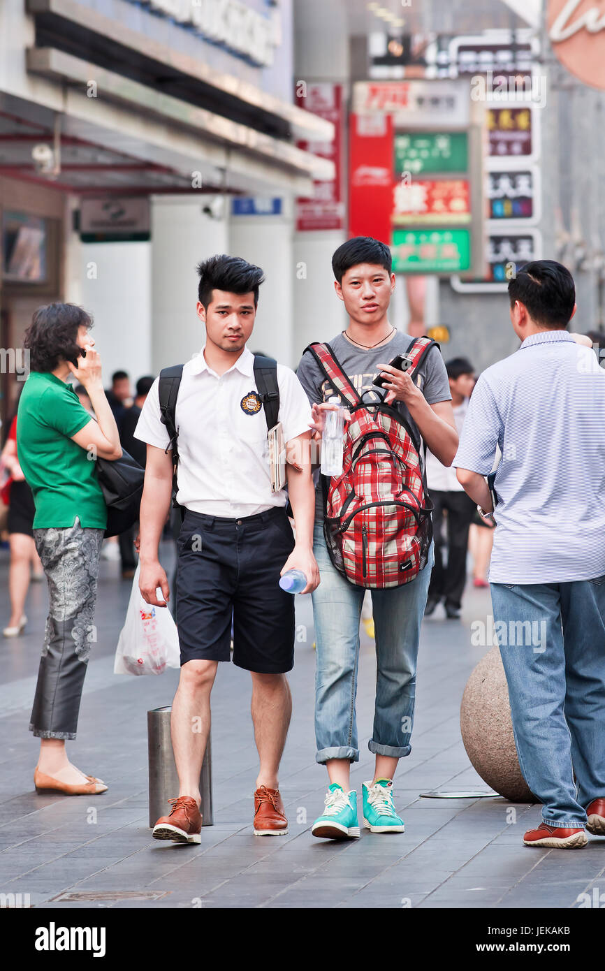 Gays in shopping area. Last decades, China's LGBT community made huge gains in social acceptance. But they still have to face political opposition. Stock Photo