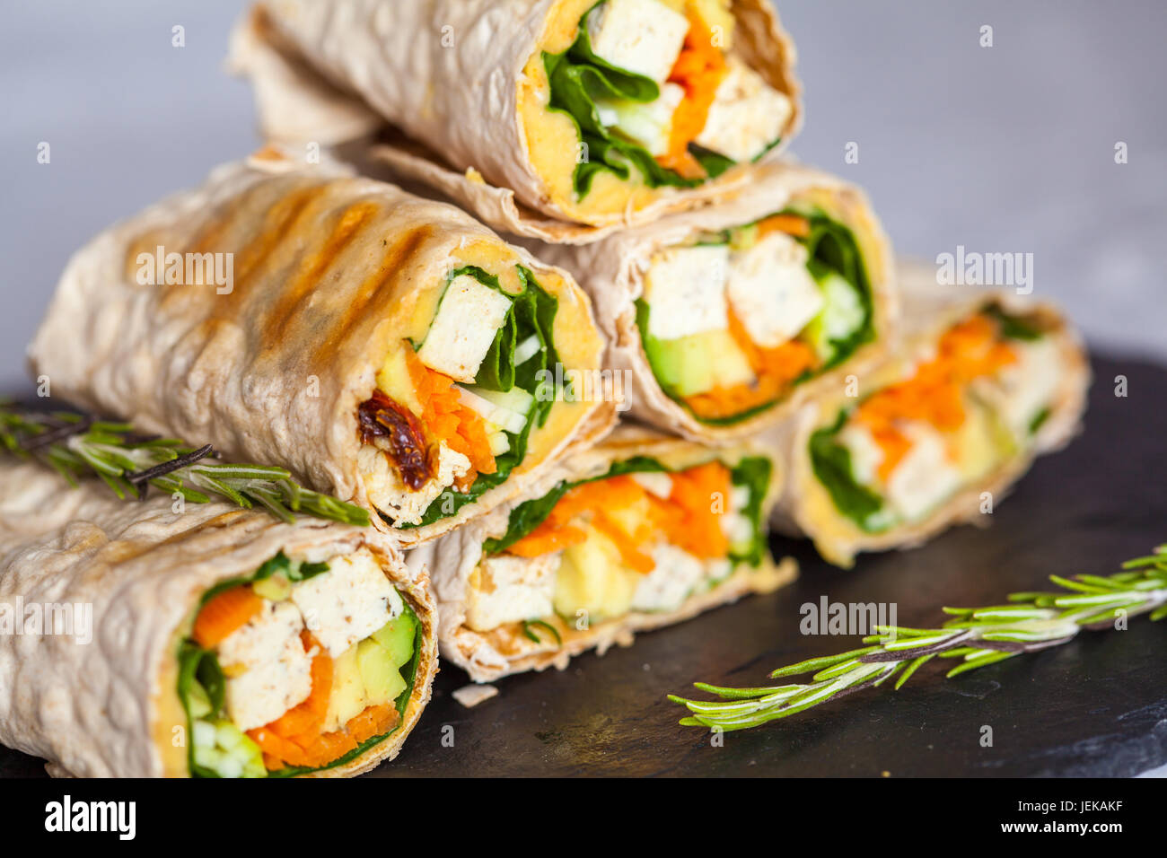 Healthy vegan tofu tortilla wraps with tofu and vegetables. Love for a