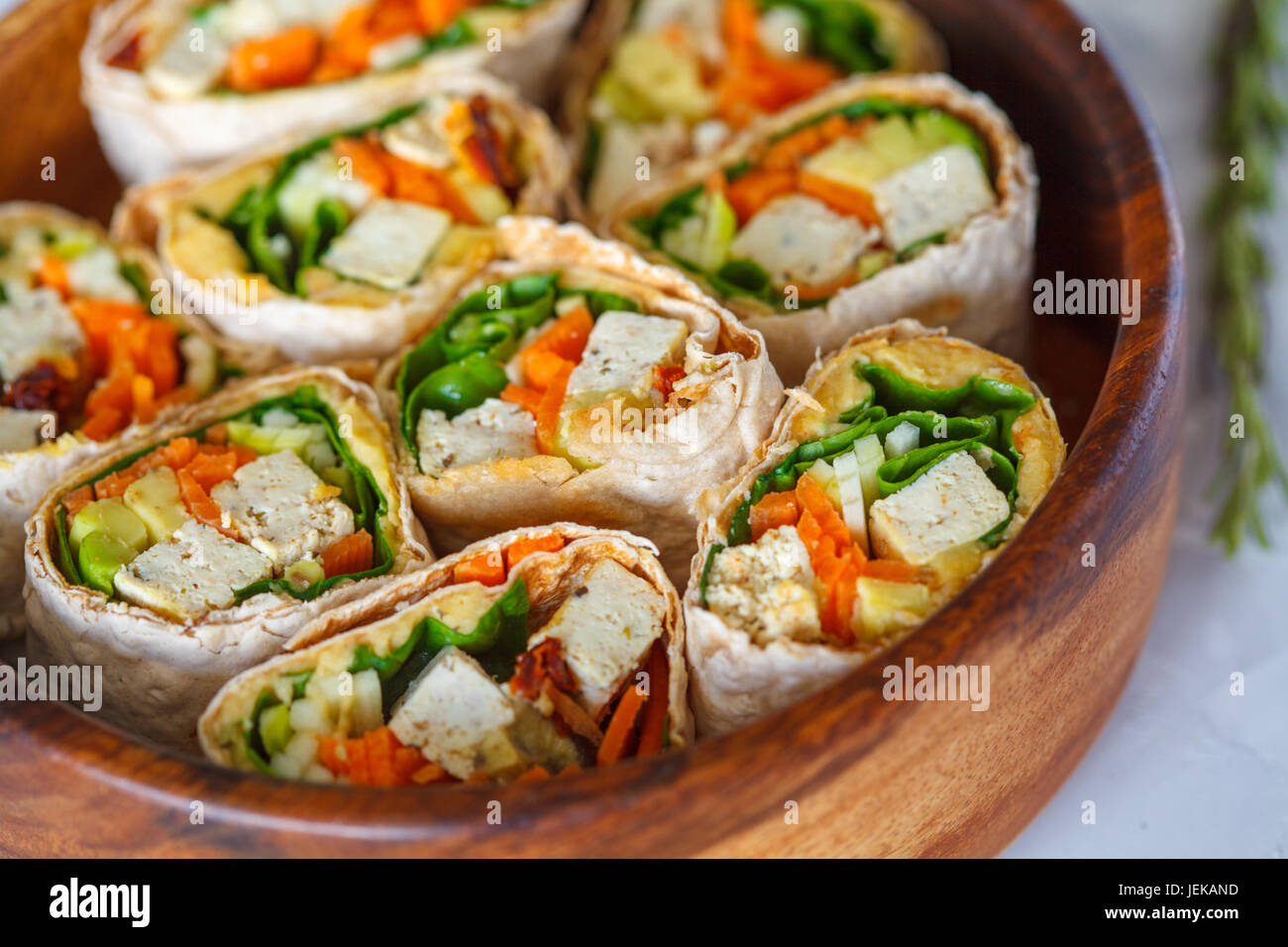 Healthy vegan tofu tortilla wraps with tofu and vegetables. Love for a