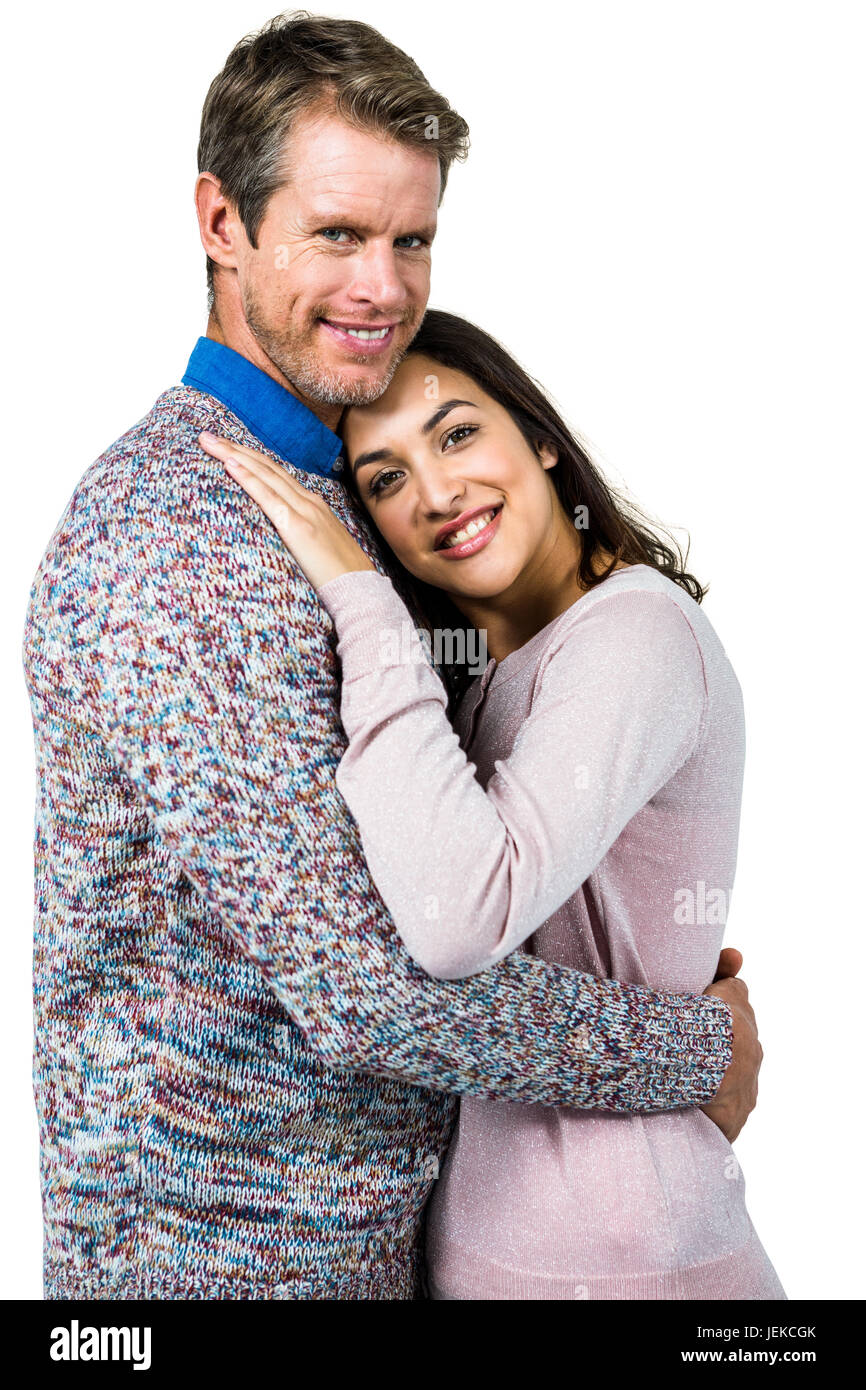 Portrait of couple hugging Stock Photo - Alamy