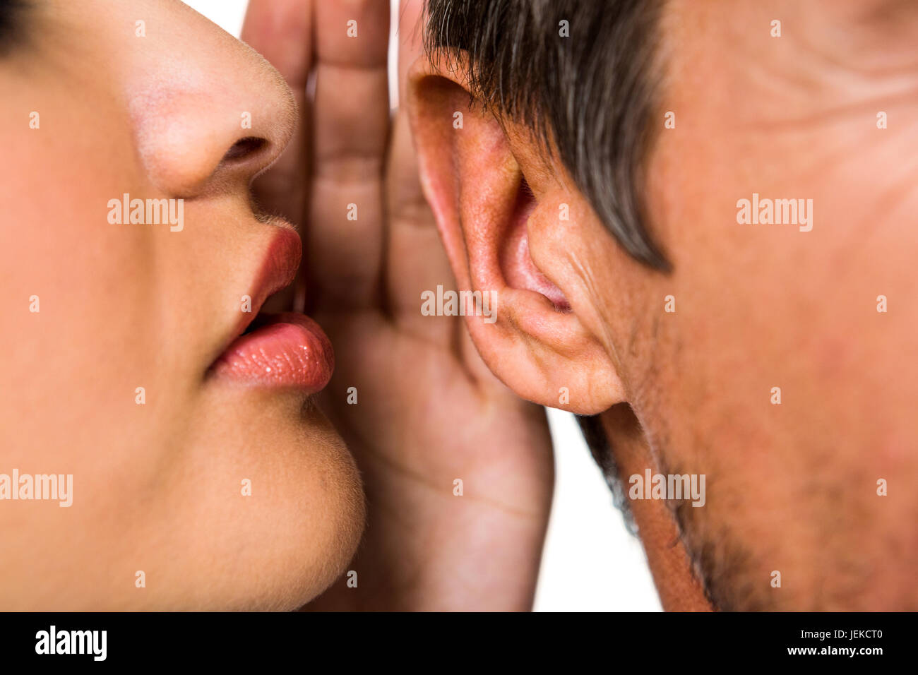 man whispering in ear