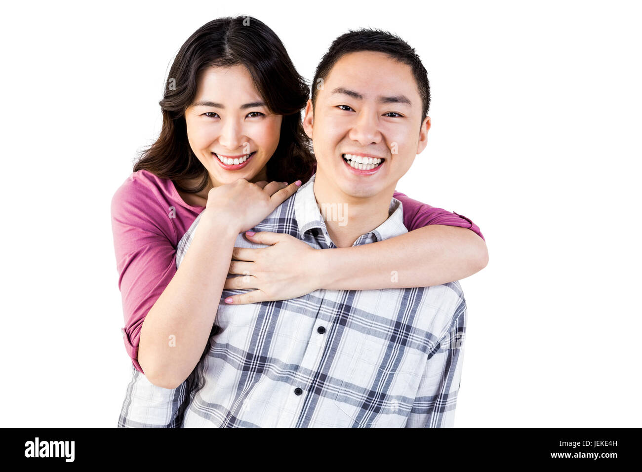 Smiling man gives girl a piggy back Stock Photo - Alamy