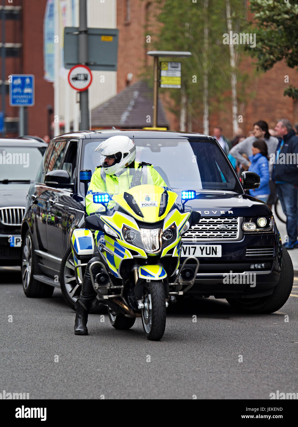 Police outrider and convoy of vehicles that escorted the Prime Minister Theresa May on a visit to Liverpool in 2017 Stock Photo