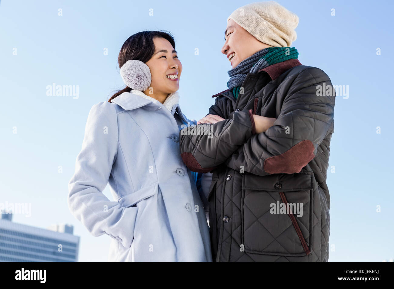 Smiling couple looking at each other Stock Photo - Alamy