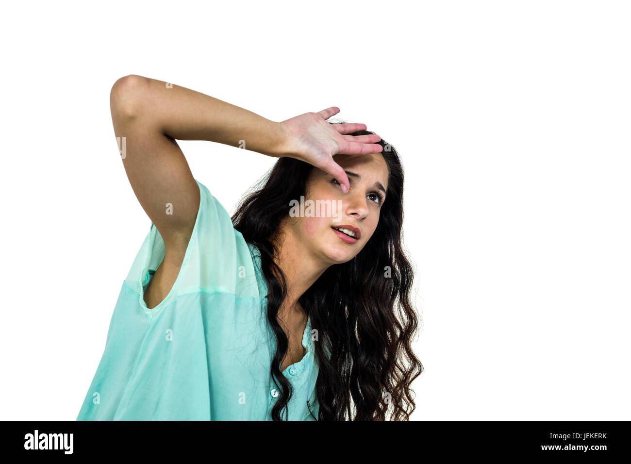 Worried woman covering her face with hand Stock Photo - Alamy