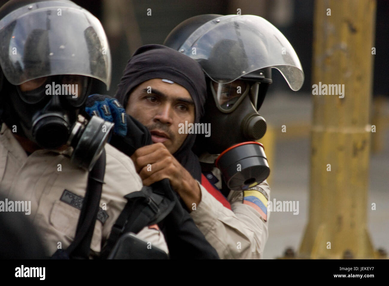 A protester detained by the Bolivarian National Police Stock Photo