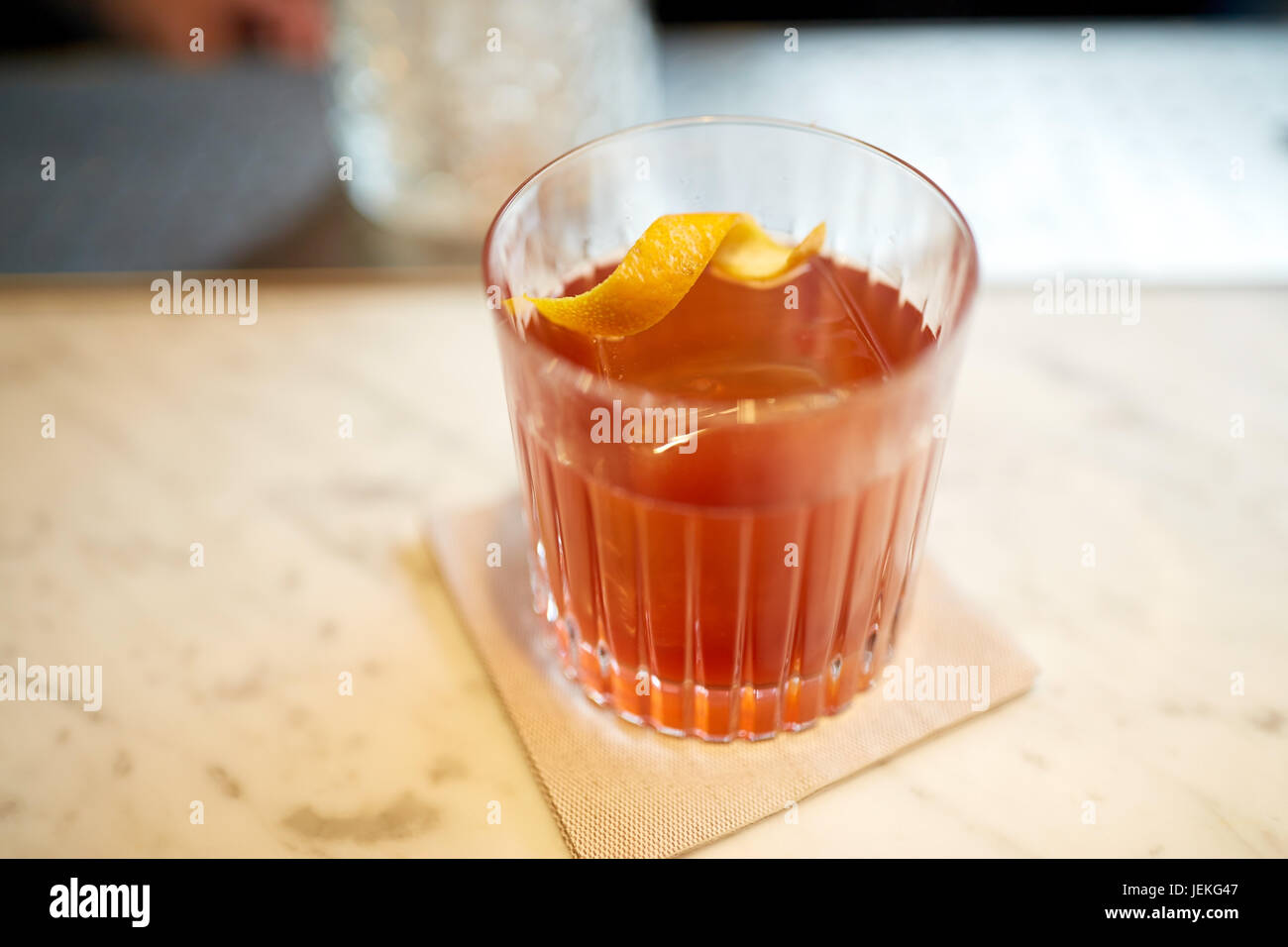 glass of alcohol cocktail on bar counter Stock Photo Alamy