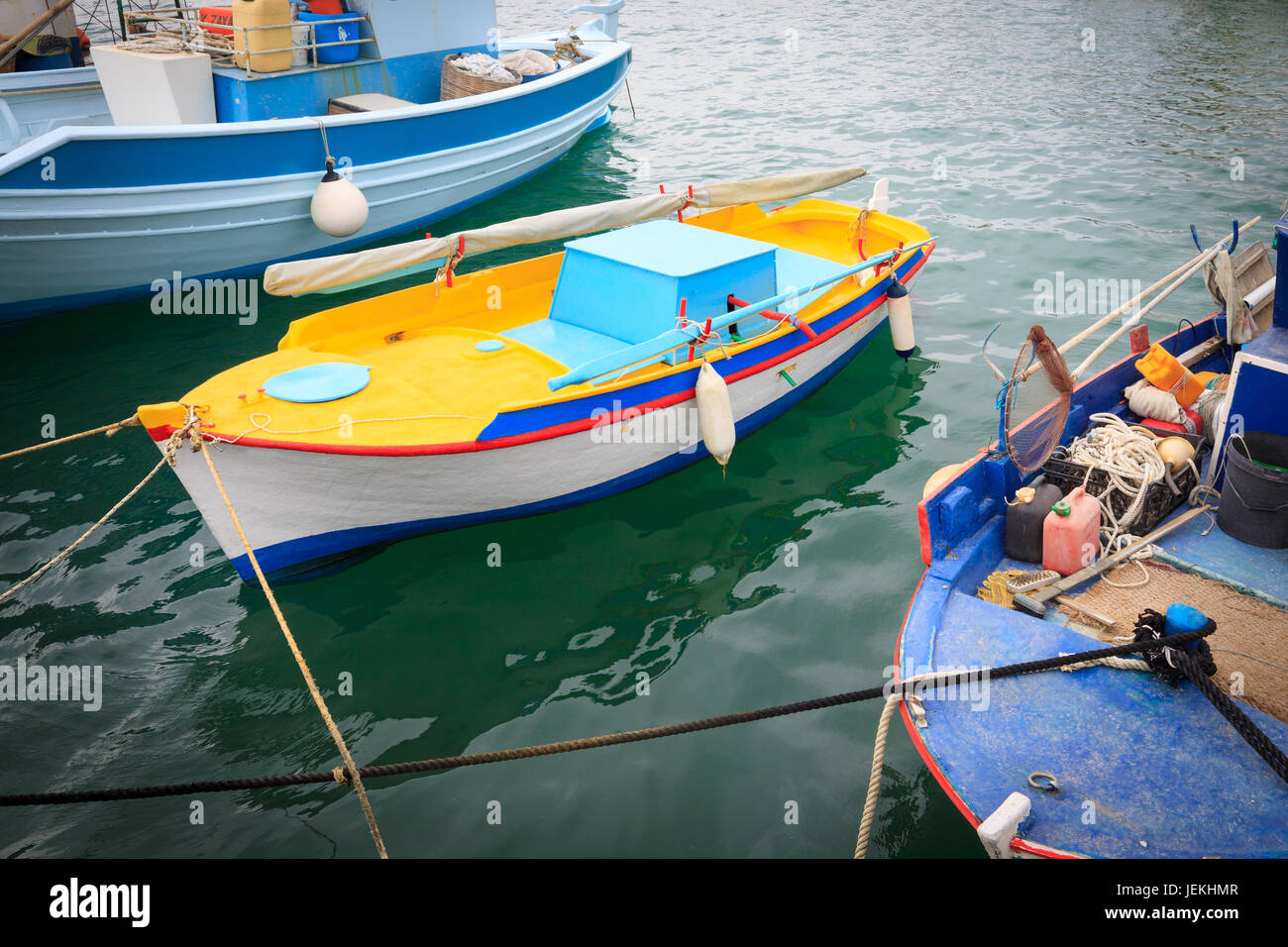 Colorful Greek fishing boats in port of Kardamena in Kos island, Greece. Stock Photo