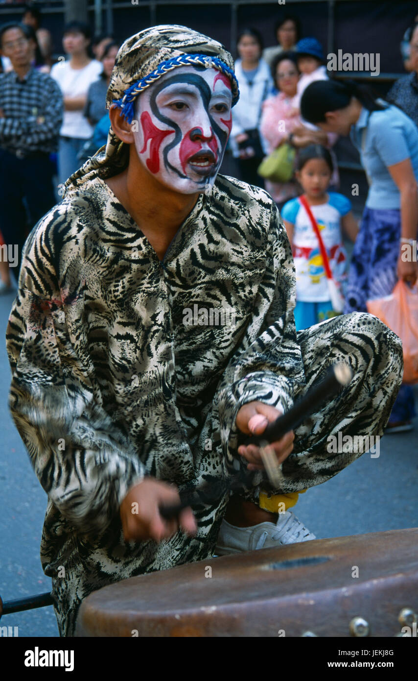 Thailand, North, Chiang Mai, Chinese New Year. Man wearing costume and