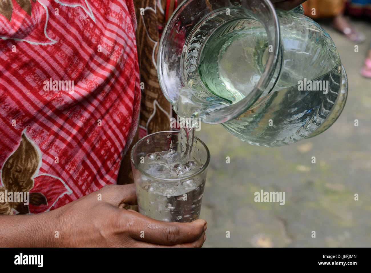 BANGLADESH, District Tangail, Kalihati, village Southpara, drinking water / Trinkwasser im Glas Stock Photo