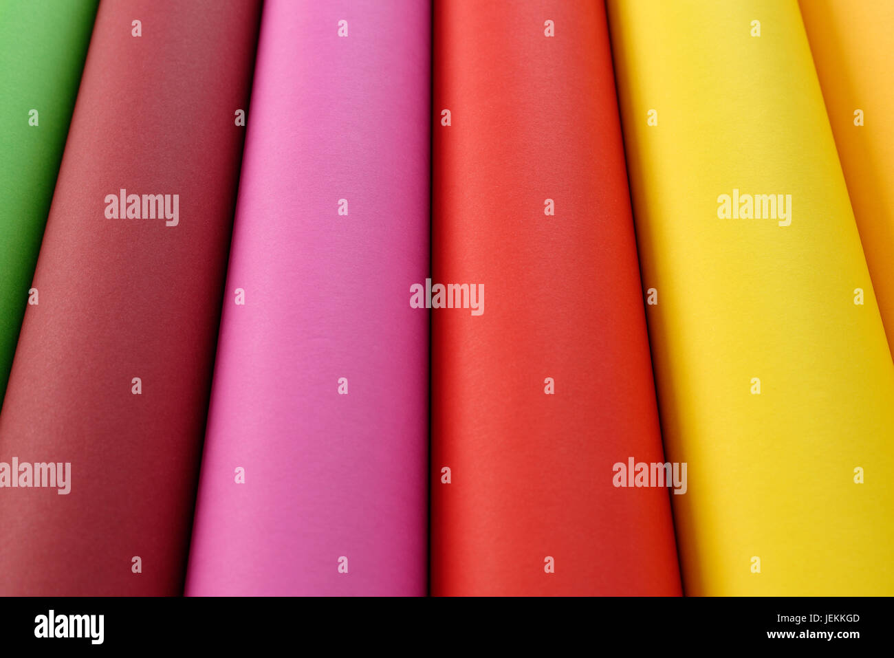 Colored paper in green, brown, pink, red yellow and orange Stock Photo ...