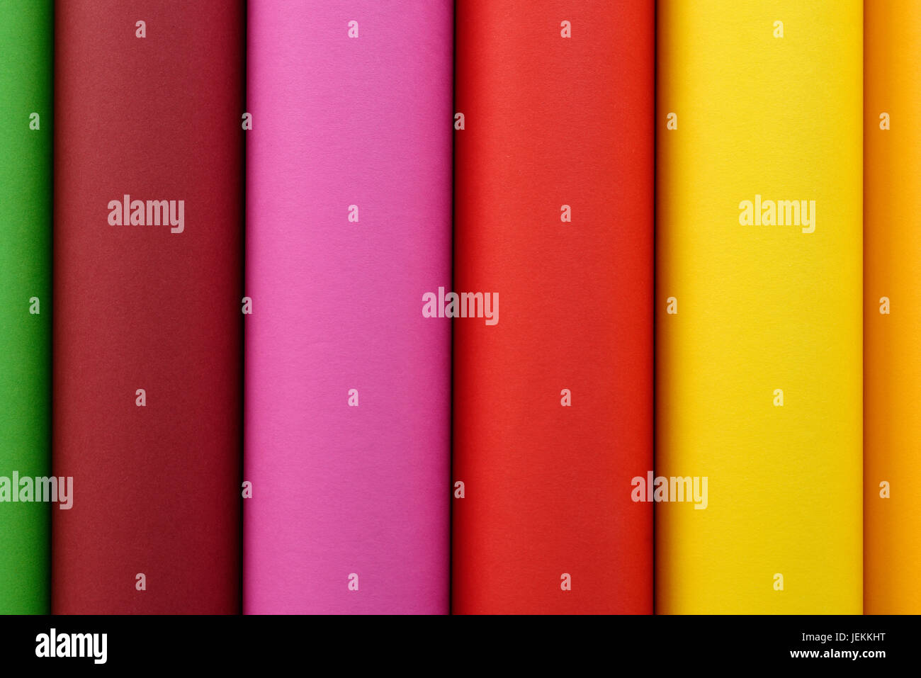 Colored paper in green, brown, pink, red yellow and orange Stock Photo ...