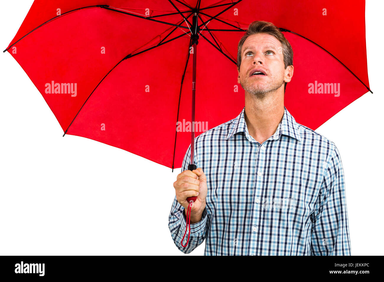 Man holding red umbrella Stock Photo - Alamy