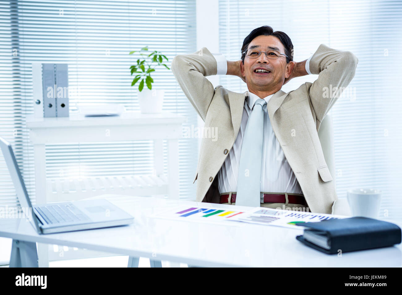 Portrait of smiling asian businessman Stock Photo - Alamy