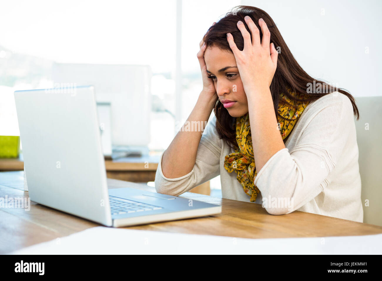 Young girl uses his computer Stock Photo - Alamy