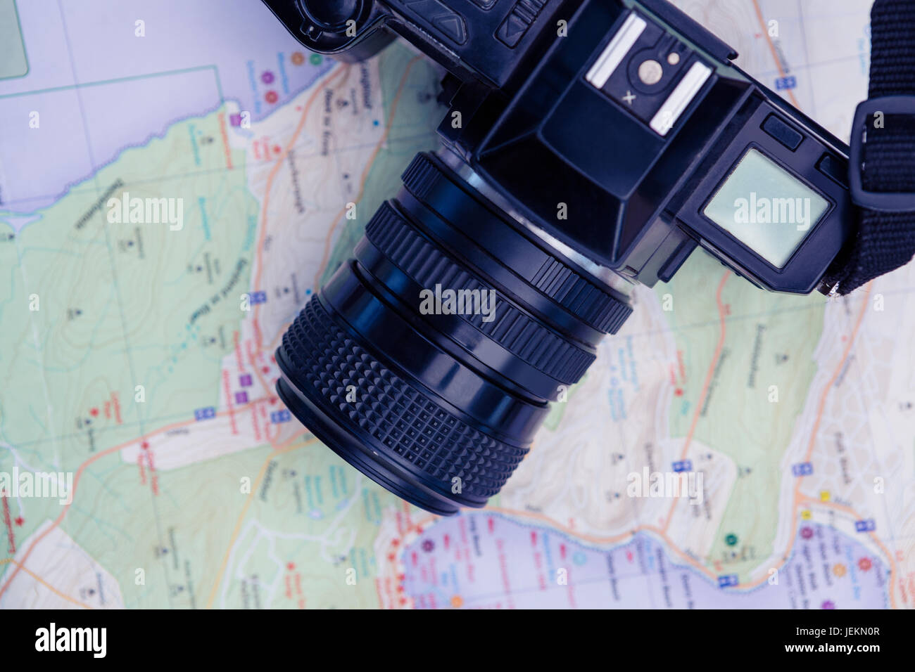 Overhead view of camera and map Stock Photo - Alamy