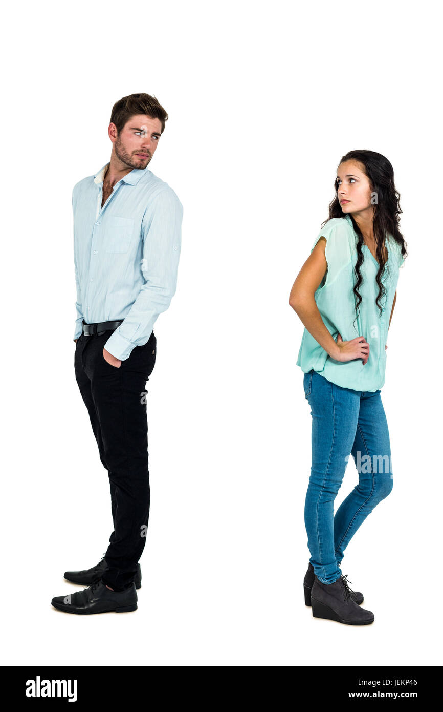 Sad couple standing back to back Stock Photo - Alamy