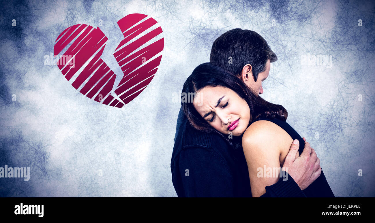 Composite Image Of Sad Couple Embracing Stock Photo Alamy