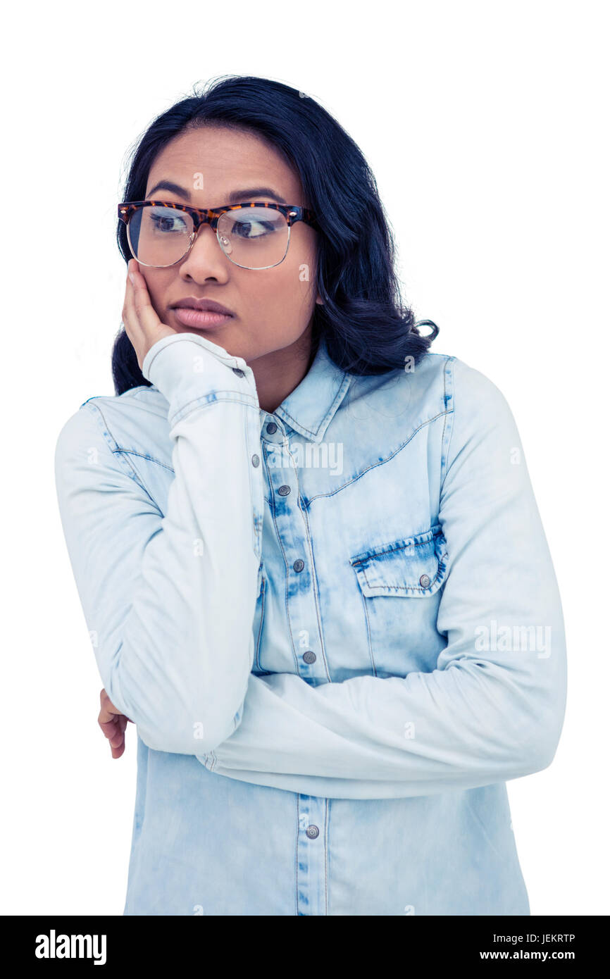 Thoughtful Asian woman with hand on chin Stock Photo - Alamy