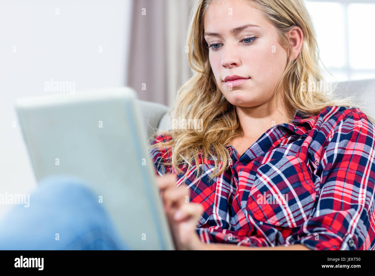 Woman using tablet computer Stock Photo