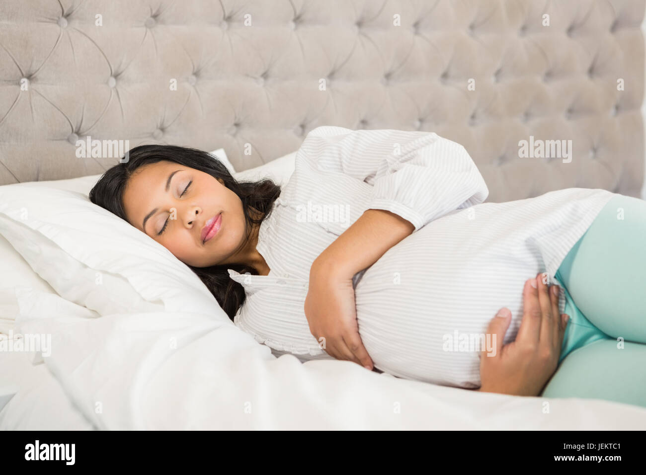 Pregnant woman sleeping Stock Photo Alamy