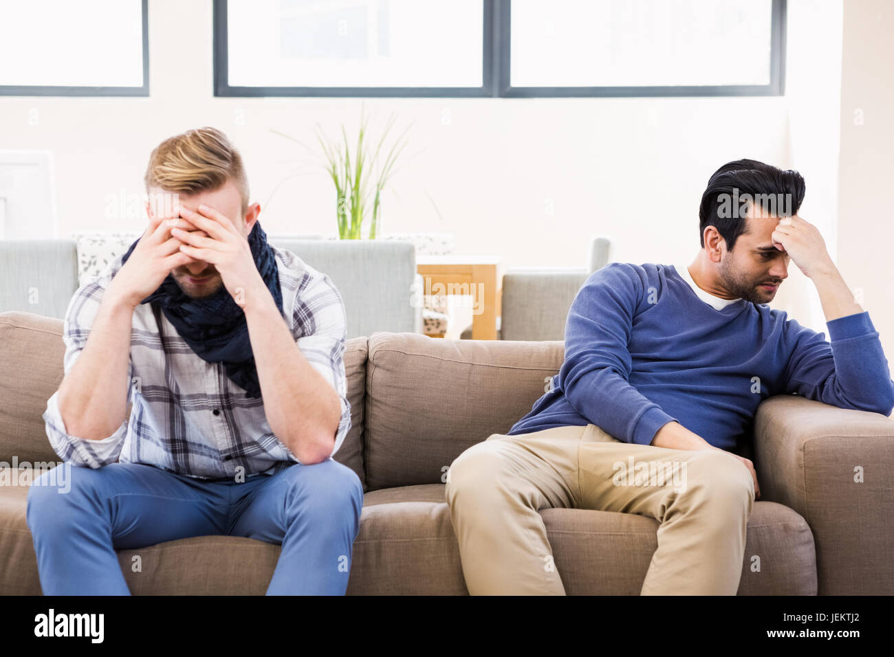 Gay couple sulking each other Stock Photo