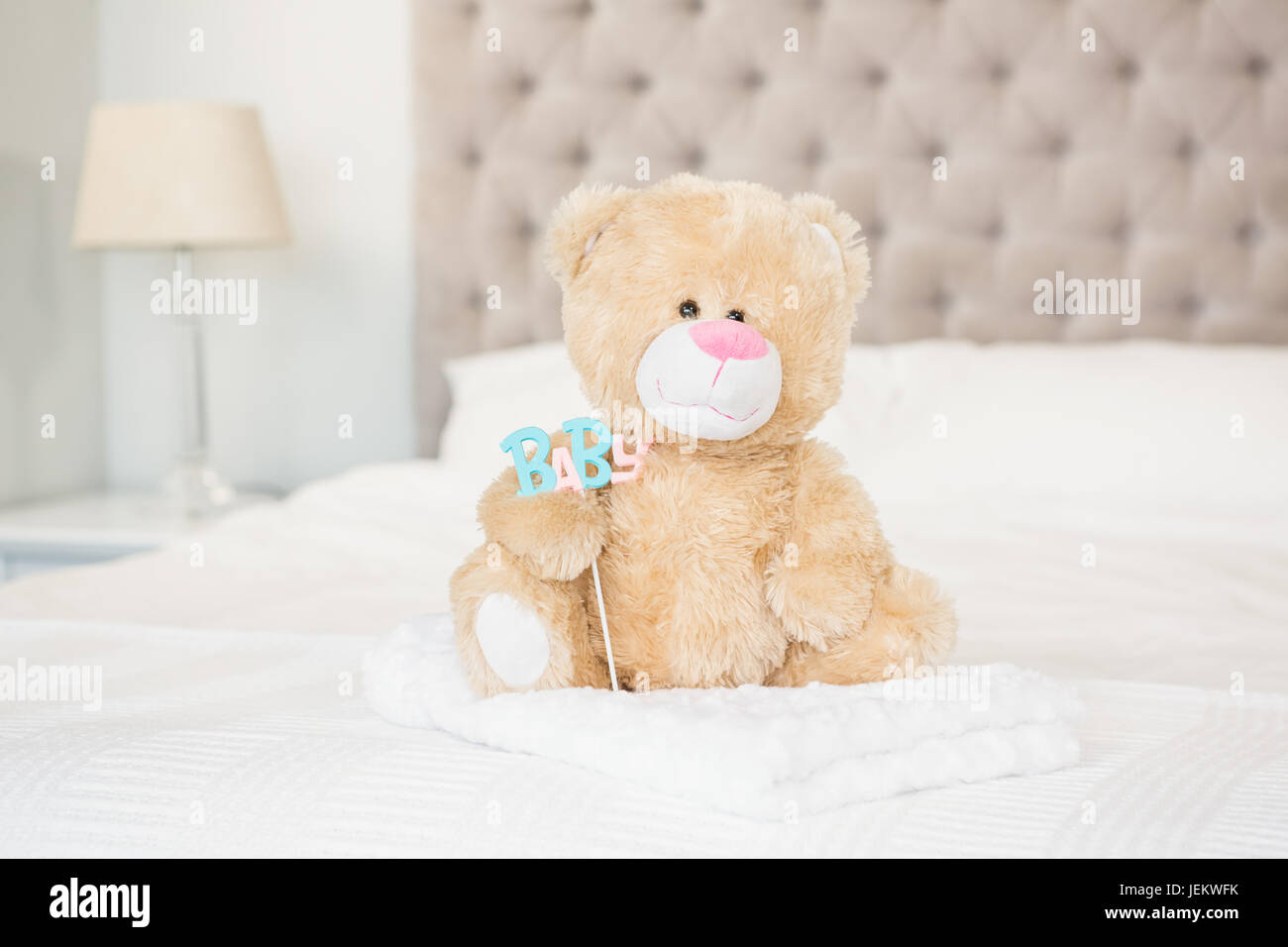 Teddy bear and baby Stock Photo - Alamy