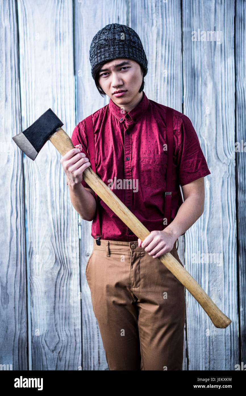 A Man Chopping Wood With An Axe Stock Photos & A Man Chopping Wood With