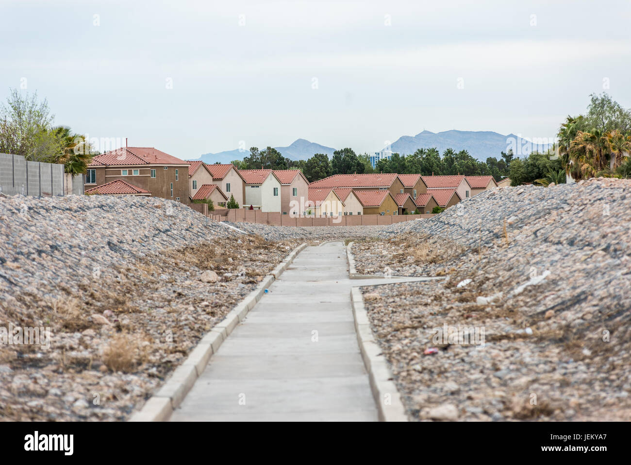 Channelized creek and rip rap leading from detention basin in western Las Vegas Stock Photo