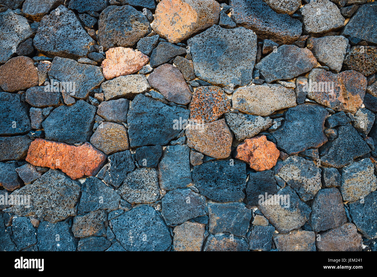 Basalt volcanic rock wall use as background Stock Photo - Alamy