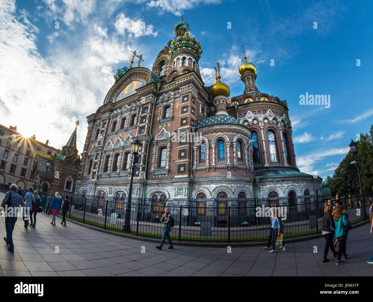 ST. PETERSBURG, RUSSIA - JULY 11, 2016: Church of the Savior on Blood against bright sun with lens flare in Saint-Petersburg, Russia. One of the main  Stock Photo