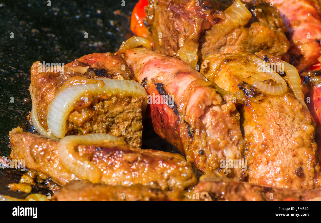 The meat is cooked in a cauldron Stock Photo - Alamy