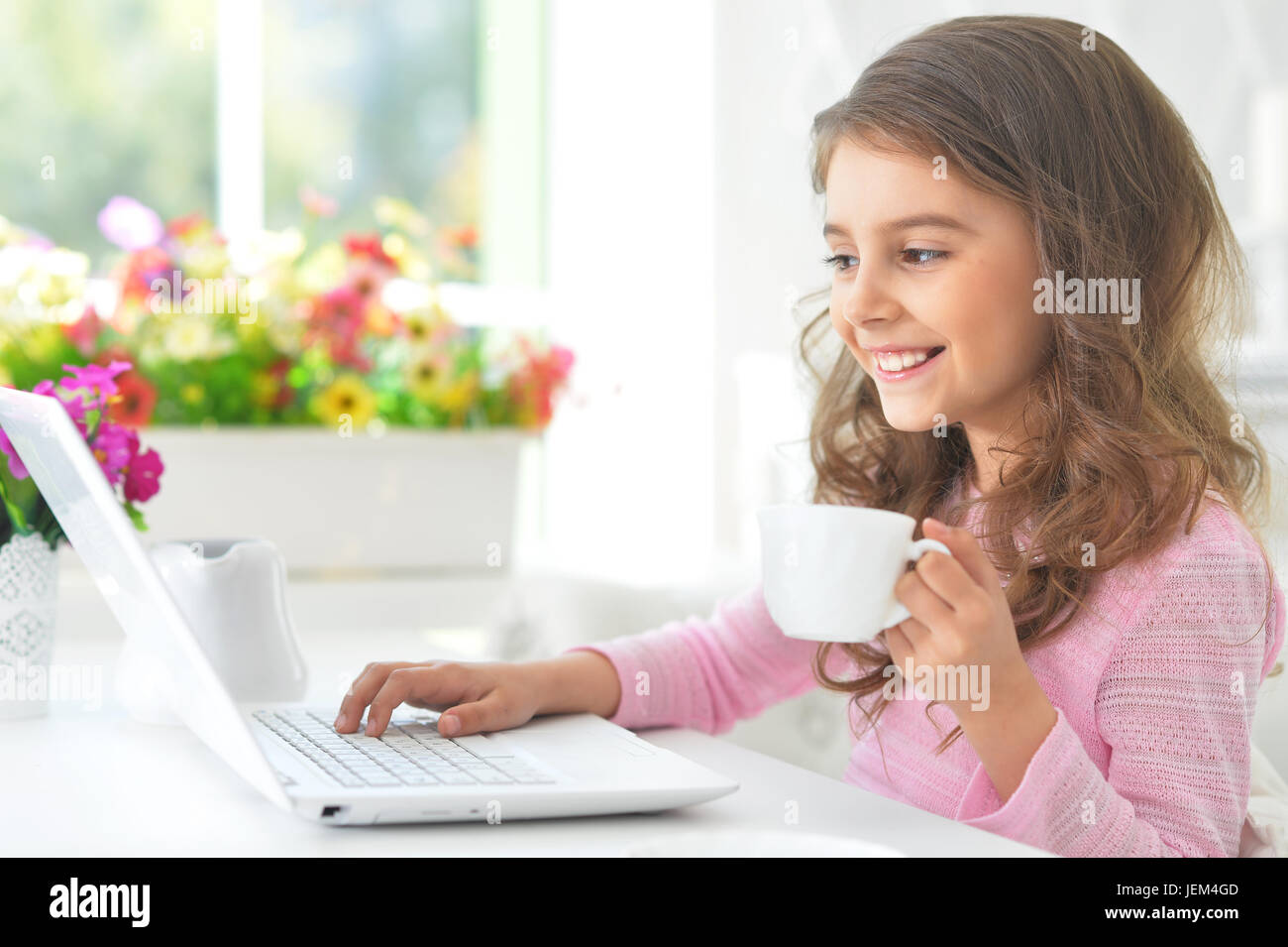 girl using modern laptop Stock Photo - Alamy