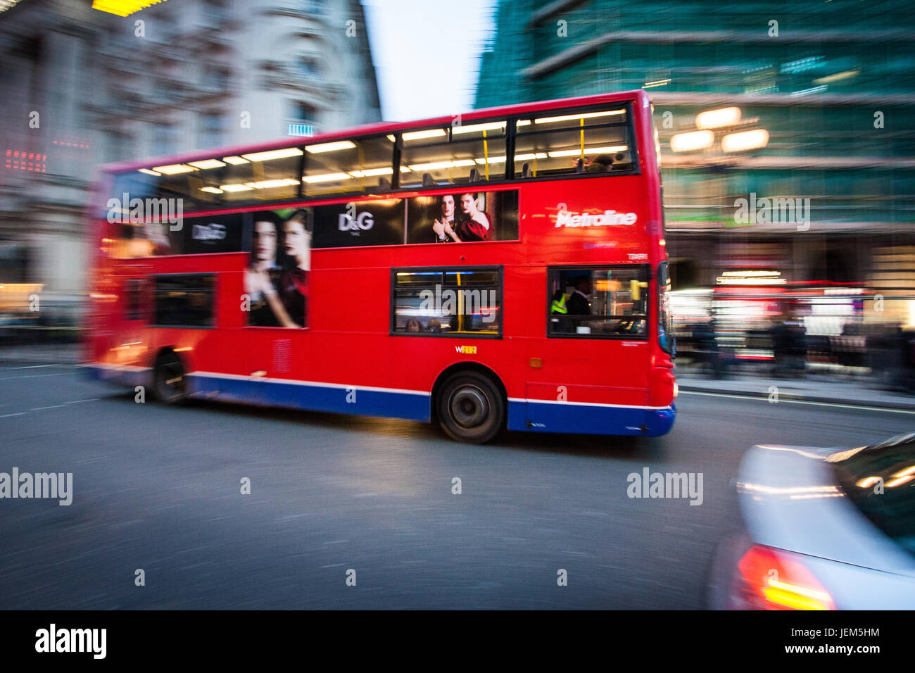 London Bus in Motion. A Motion Blur shot of a London Bus moving through Central London Stock Photo