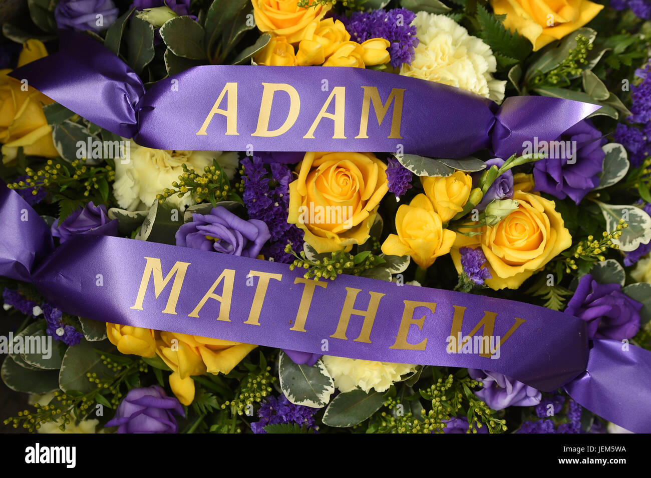 Floral tributes and messages outside St Mary's Church, Hinckley