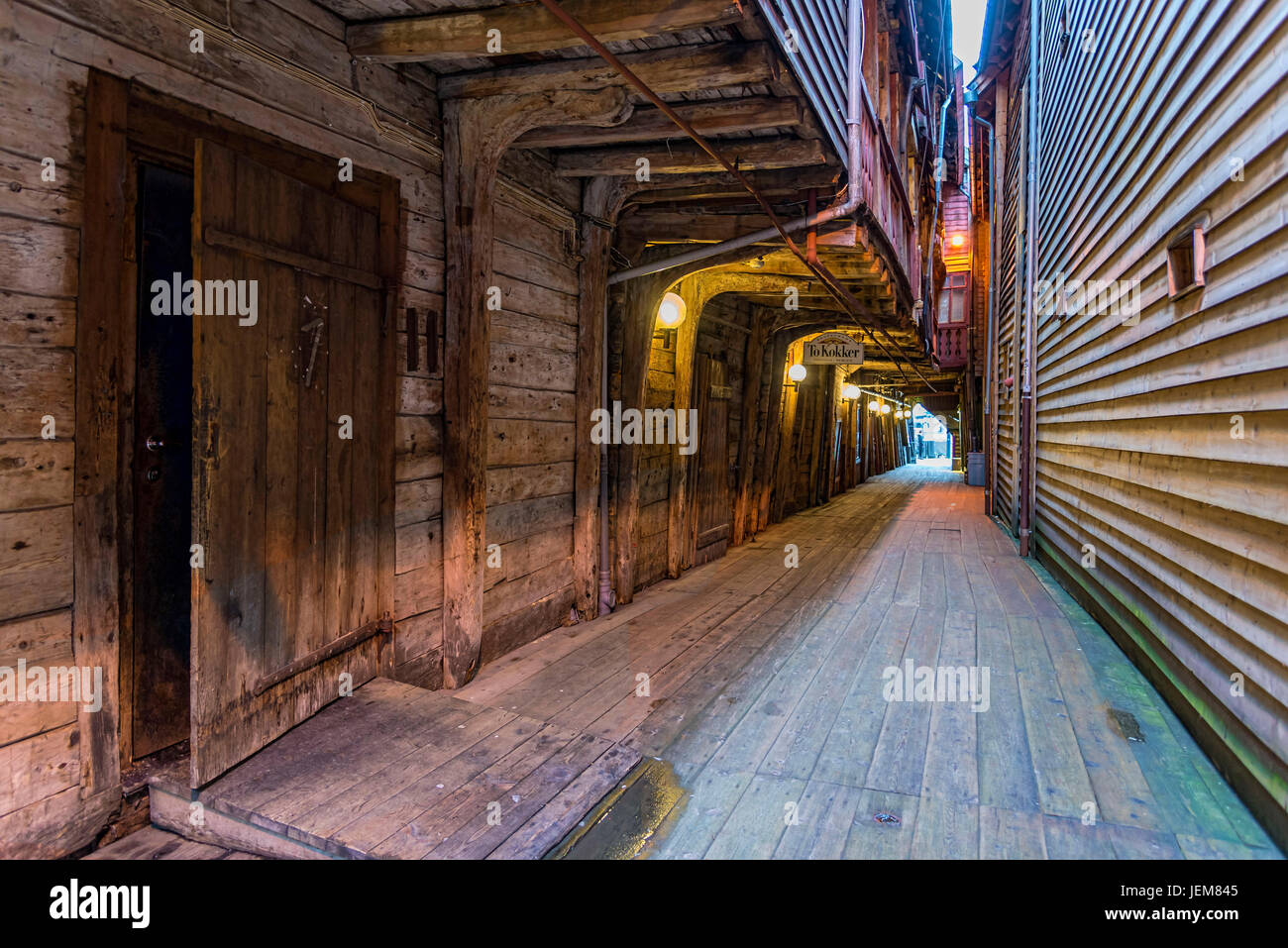 Bergen, Norway - August 14, 2016: A Narrow passage in the Bryggen district. Is a series of Hanseatic commercial buildings Stock Photo