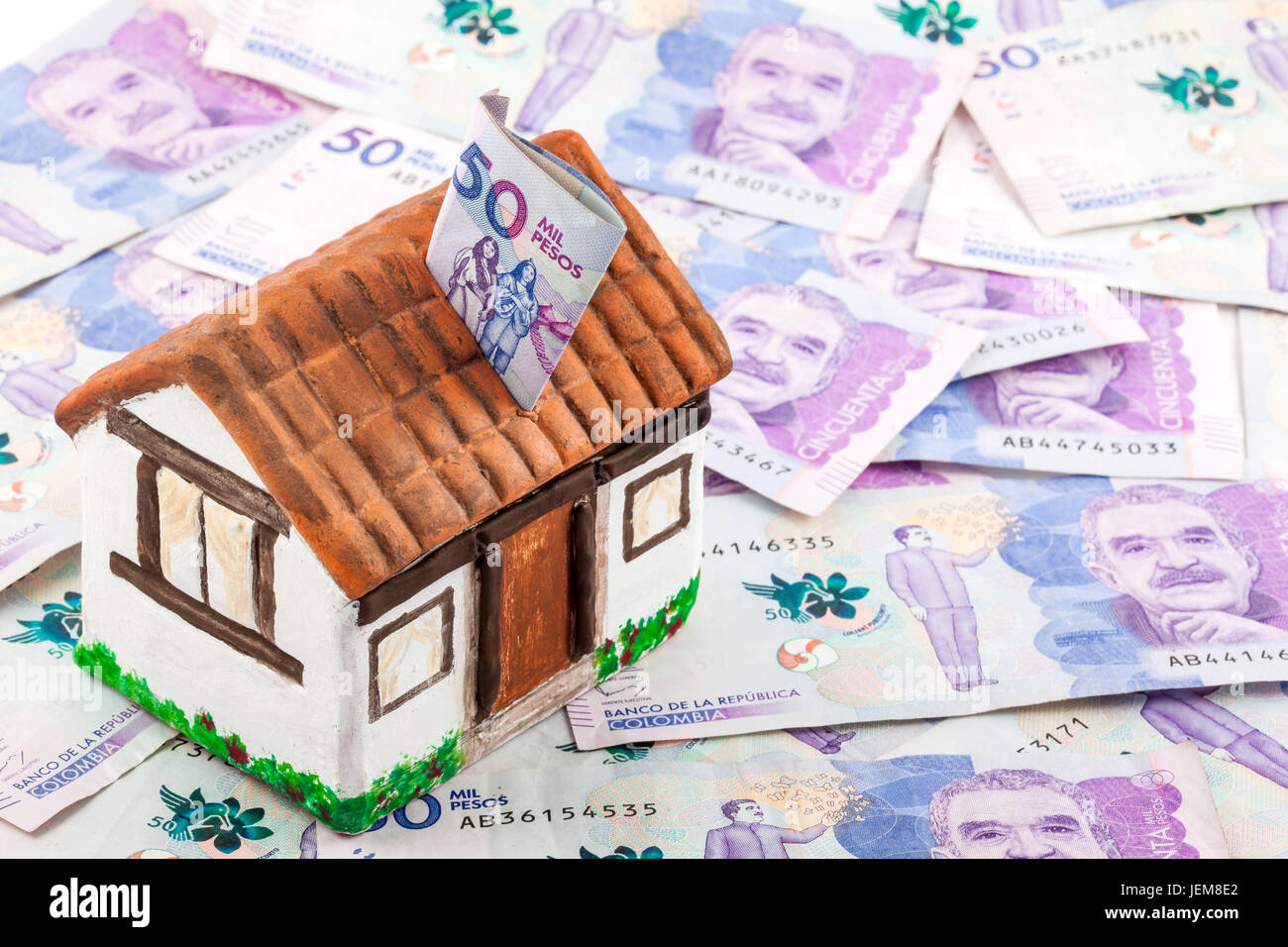 Saving Fifty Thousand Colombian Pesos Bills to buy a house Stock Photo Alamy