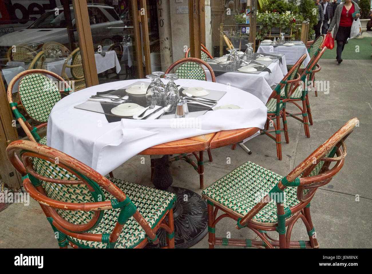 cafe tables outside a restaurant in little italy New York City USA Stock Photo