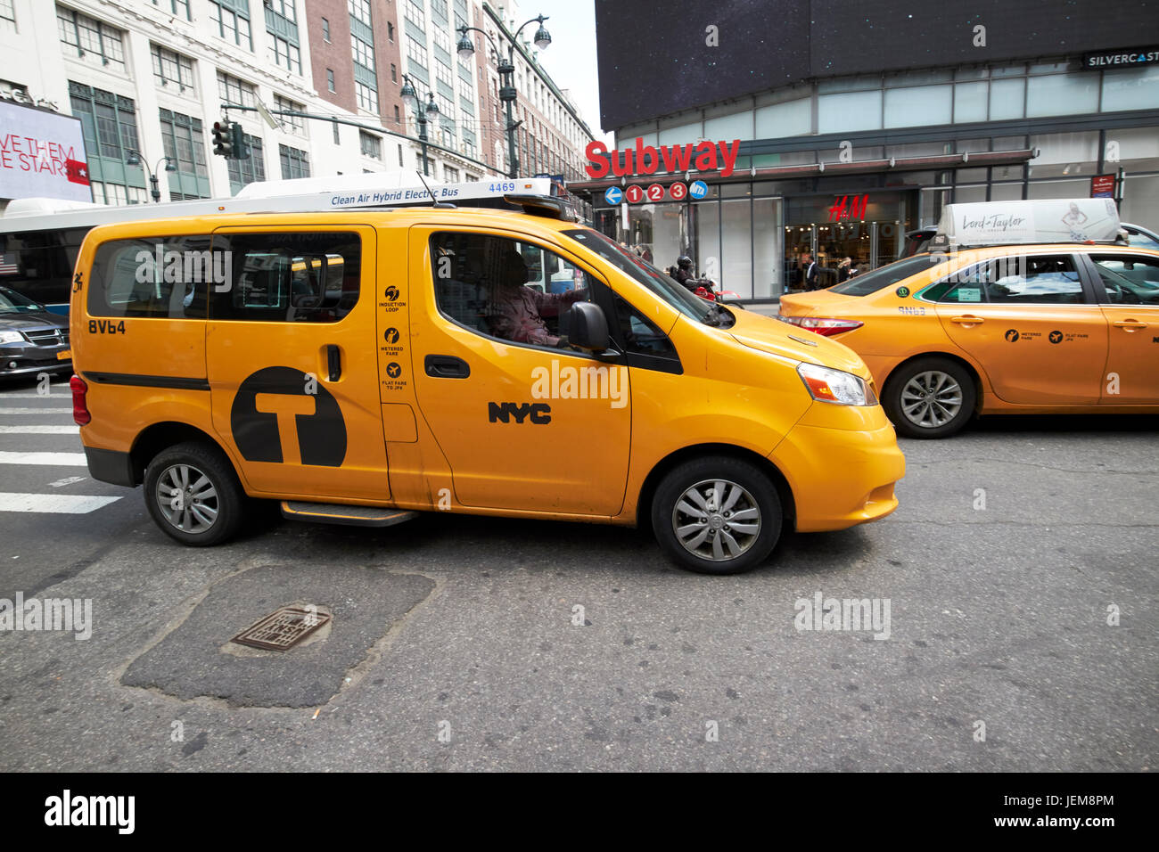 Nissan NV200 yellow cab New York City USA Stock Photo
