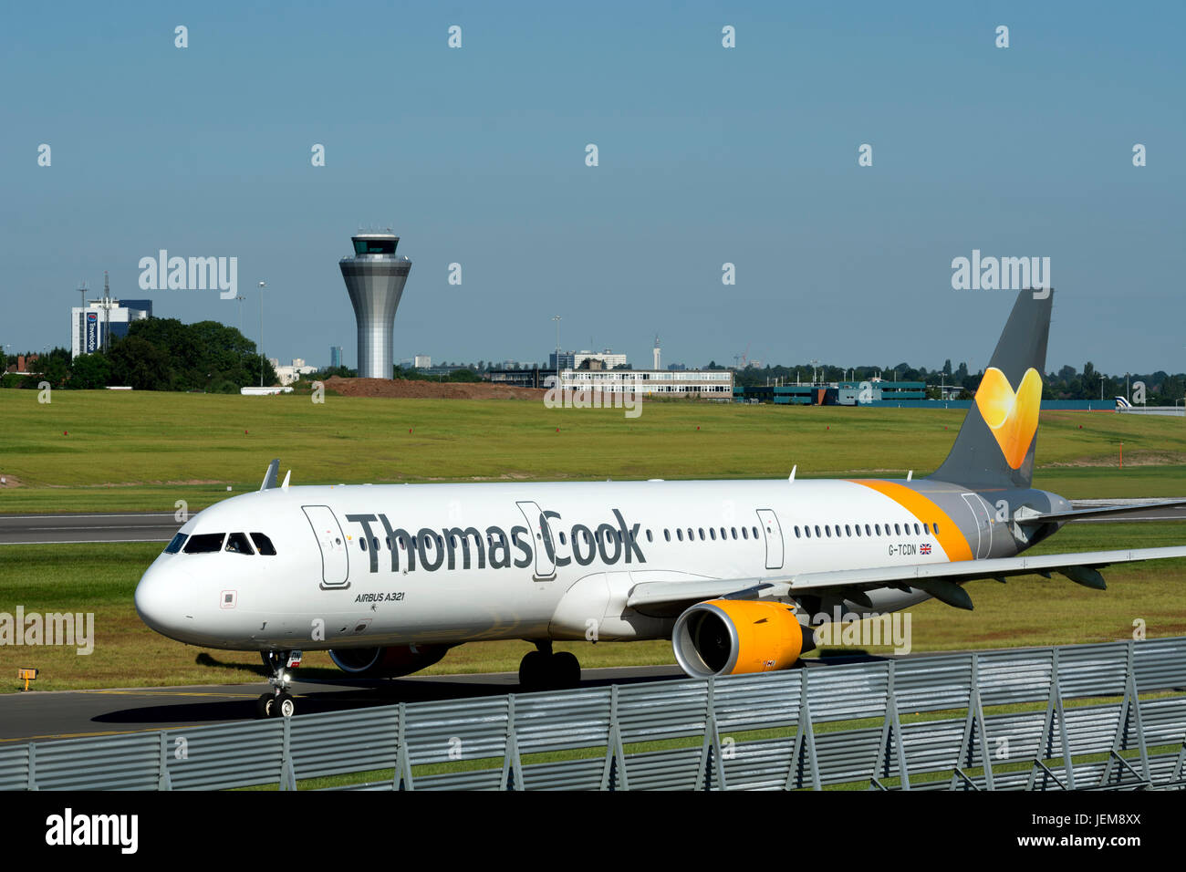 Thomas Cook Airbus A321 taxiing to depart from Birmingham Airport, UK (G-TCDN) Stock Photo