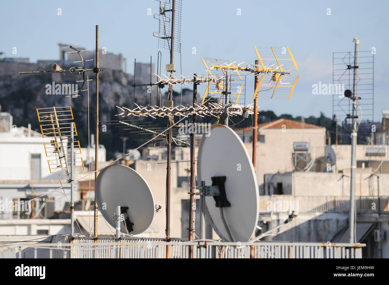 Televion aerial sand parabolic antennas on building's roof, Athens