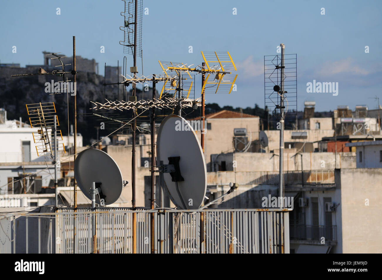 Televion aerial sand parabolic antennas on building's roof, Athens