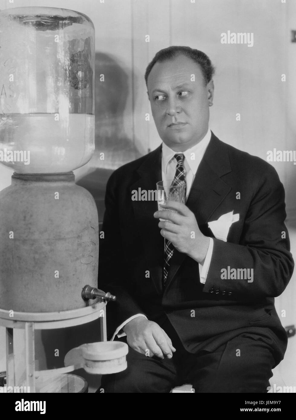 Actor Emil Jannings, Publicity Portrait at Water Cooler, 1929 Stock Photo