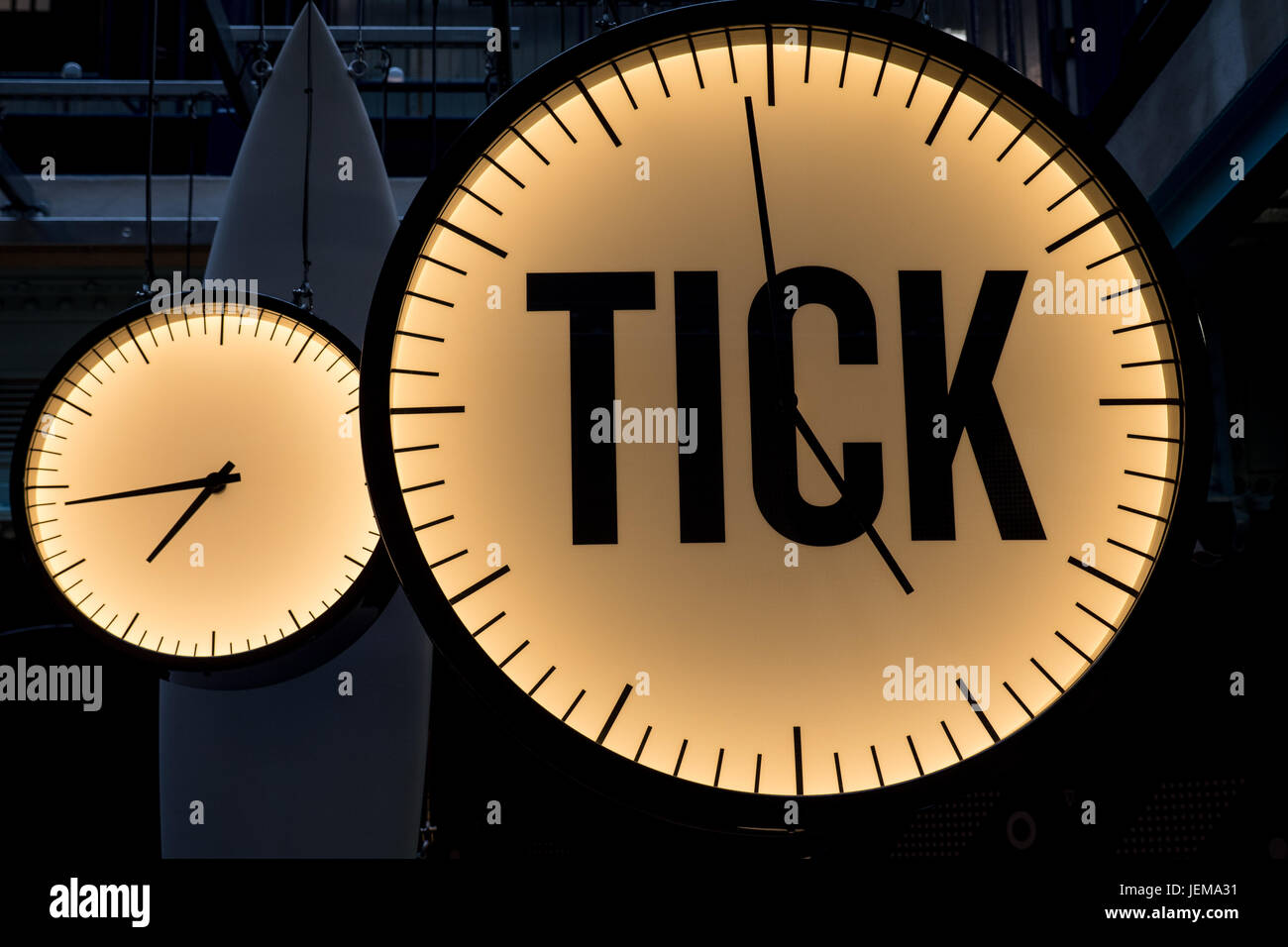 The word Tick on a clock face as made famous on one of the Guinness TV adverts. Stock Photo