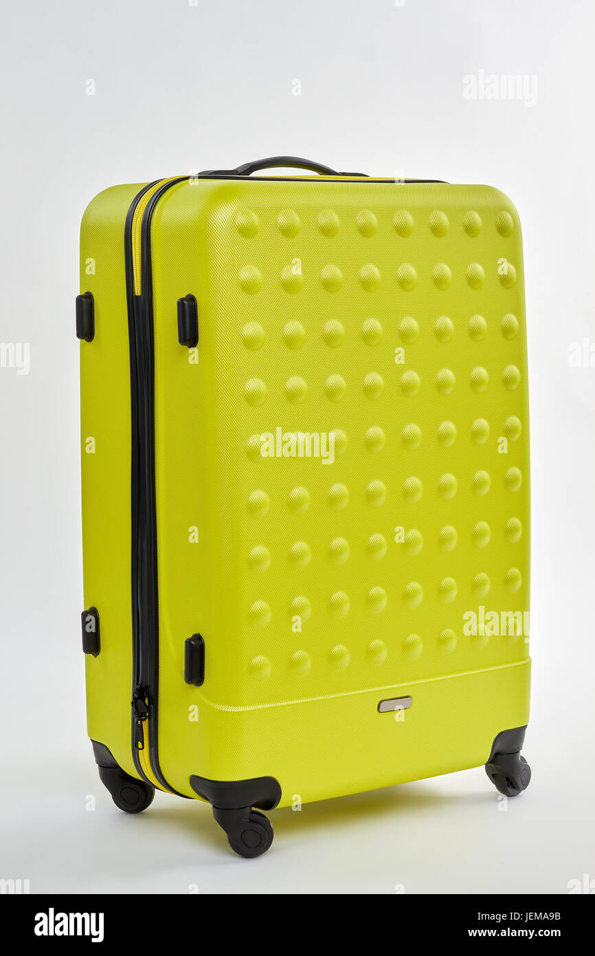 Modern travelling suitcase close up. Luggage bag on wheels, white background Stock Photo Alamy